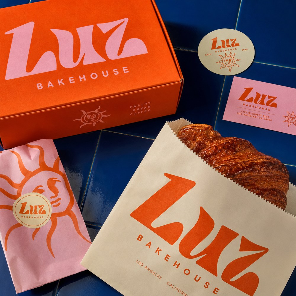 Luz Bakehouse colorful bakery packaging, pastry bag, stickers, and business card mockup